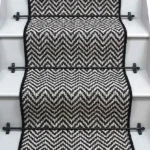 Atlantic Herringbone Orca Stair Runner on a staircase with rods.