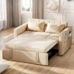 Beige, tufted, two-seater sofa bed partially extended
