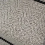 Close-up of Aspen Herringbone Wool Stair Runner texture.