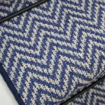 Close-up of Atlantic Herringbone French Blue Stair Runner texture.