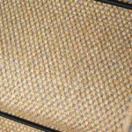 Close-up of natural mini basketweave sisal texture with blue accents.