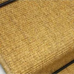 Close-up of natural mini boucle sisal texture.
