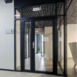 Commercial glass double doors with a black metal frame