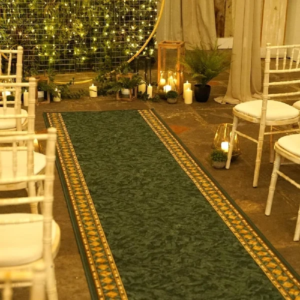 Dark green patterned runner with a gold and brown border