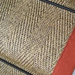 Herringbone Pewter Sisal Stair Runner on a staircase with a black border. (1)