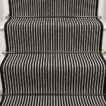 Magpie striped stair runner with black and white stripes and brass stair rods. (1)