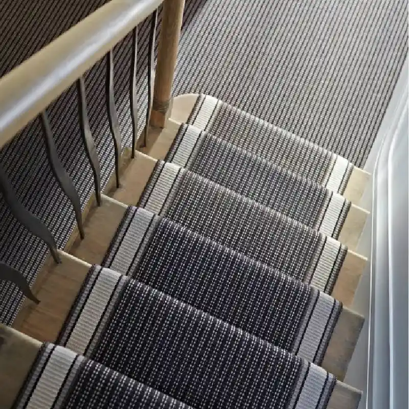 Striped stair runner with central dark band and light borders