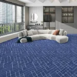 Wall-to-wall royal blue carpet with a geometric pattern