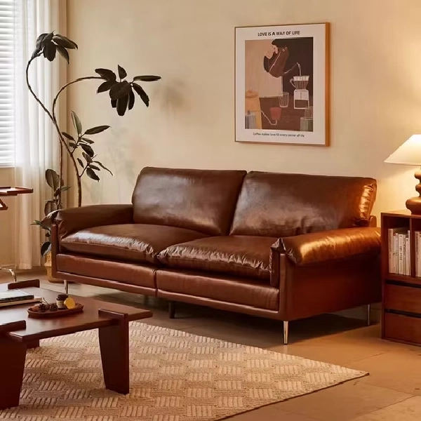 Well-maintained brown leather sofa.