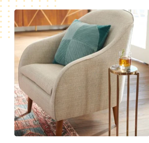 beige barrel accent chair with tapered wood legs