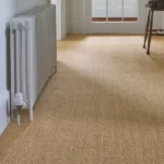 beige sisal carpet with a tight, basket-weave texture