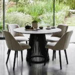 beige upholstered dining chairs with black legs