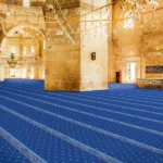 completely floored with a patterned blue mosque carpet