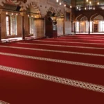 deep red mosque carpet with white geometric borders