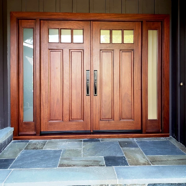 double entry doors with upper glass panels and long black handles
