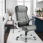gray and black executive office chair with curved chrome arms