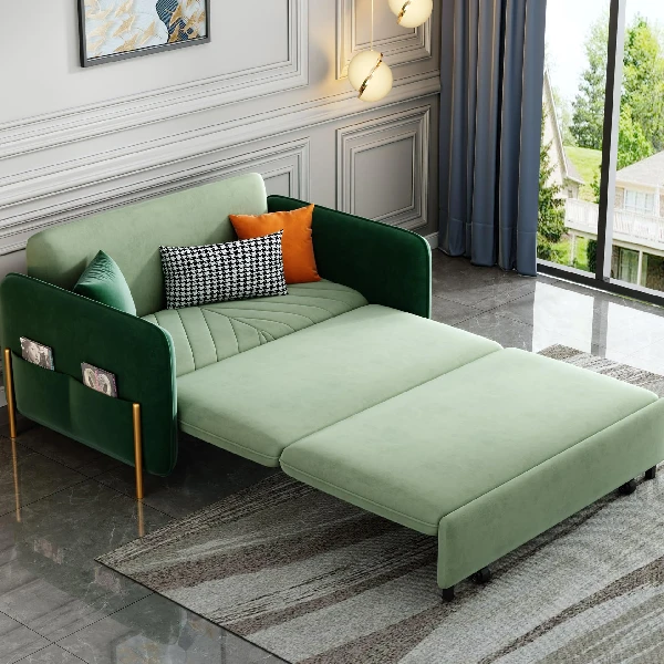 green velvet sofa bed with a light mint green pull-out section, partially extended.