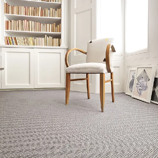 light grey sisal carpet with a chevron pattern