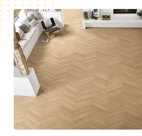 light wood LVT flooring laid in a chevron pattern