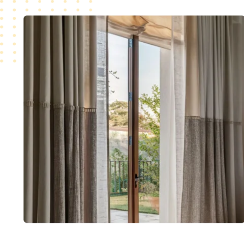 linen curtains in neutral beige and brown with a decorative horizontal band