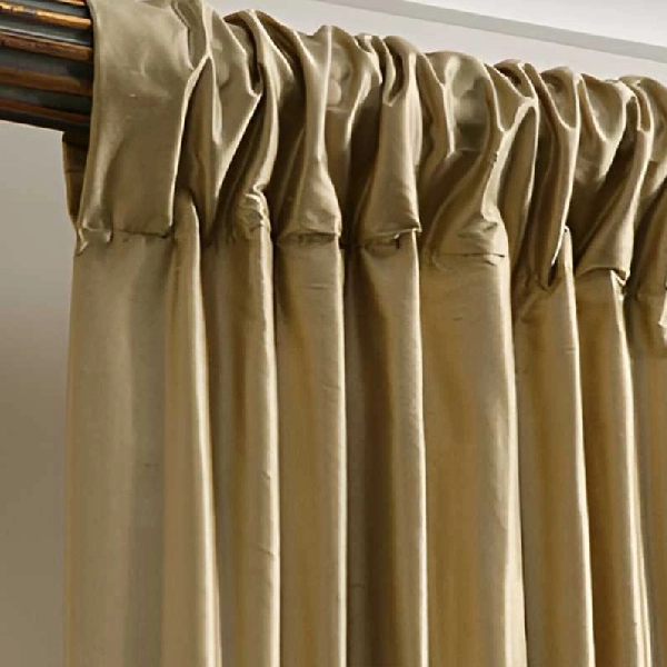 motorized gold silk curtain with a rod pocket curtain
