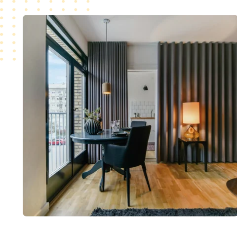 motorized wave fold curtains partitioning a room
