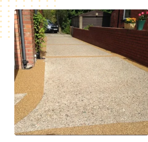 way paved with two tone stone carpet