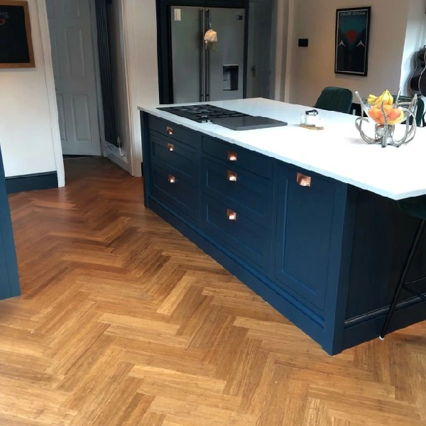 Herringbone pattern bamboo flooring in kitchen