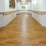 Hospital corridor with wood-look plank flooring