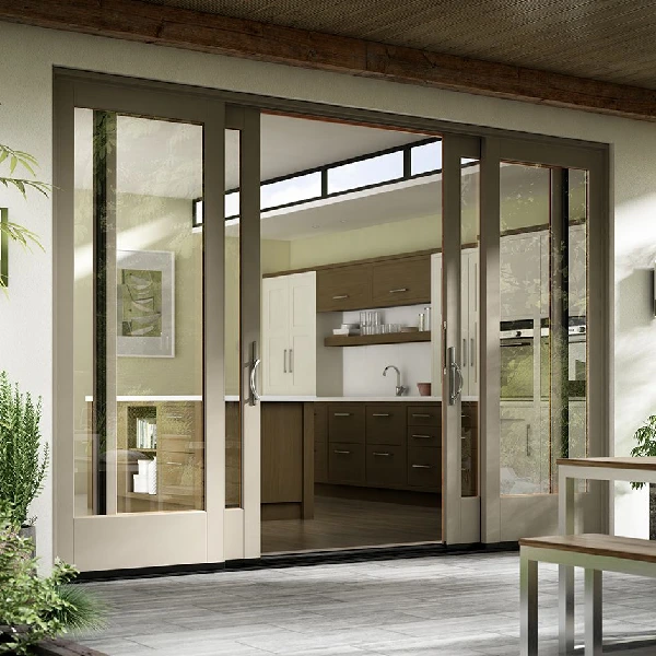 Large multi-panel sliding glass doors with taupe frames