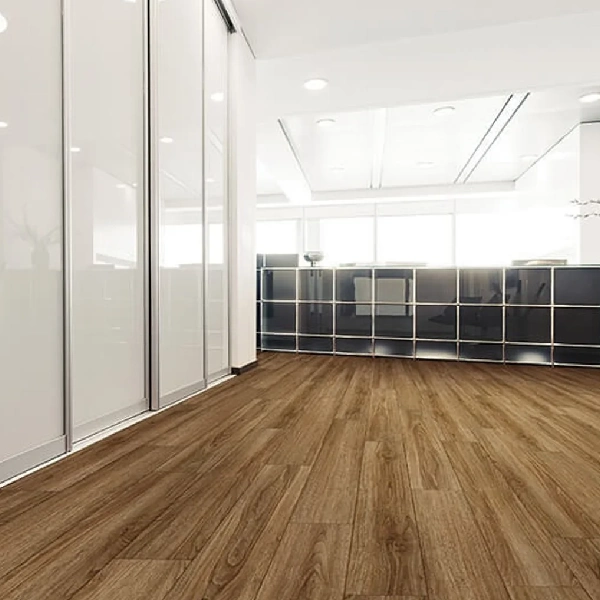 Medium brown wood-look vinyl flooring in modern office