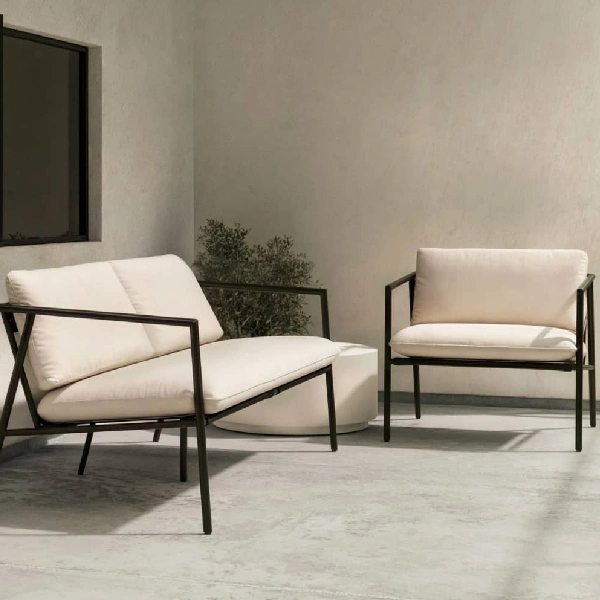 Modern outdoor lounge chairs with white cushions