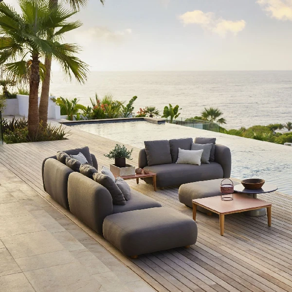 Modular gray outdoor sofa set with rounded cushions