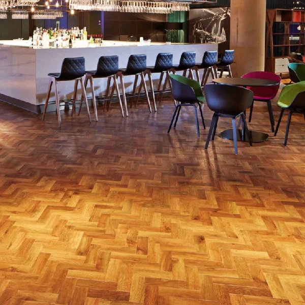 Oak herringbone pattern vinyl flooring in modern restaurant