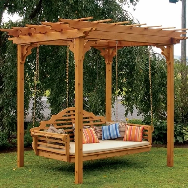 Rustic wood porch swing with a slatted back and white cushion
