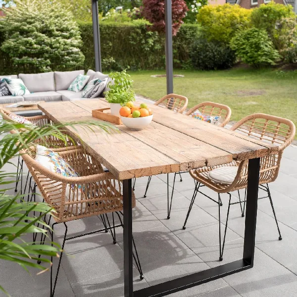 Rustic wooden plank outdoor dining table