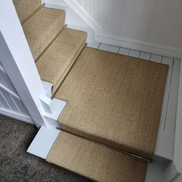 Textured beige sisal-style carpet runner