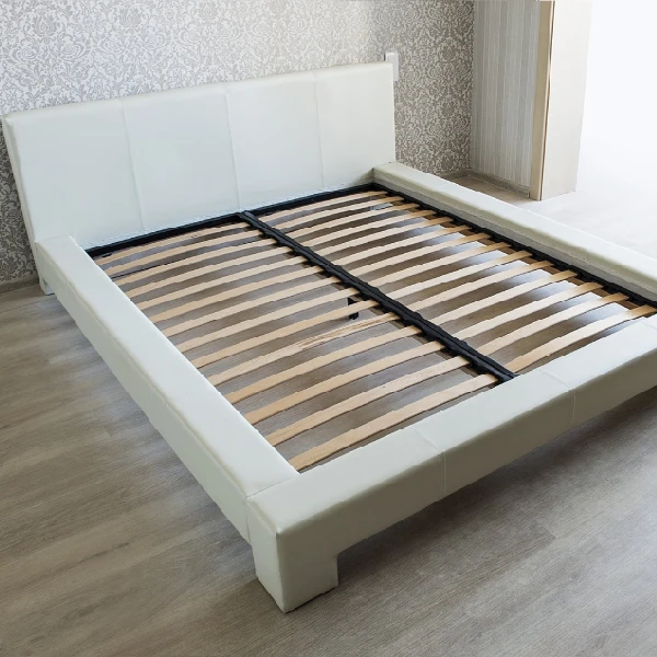 White upholstered diwan bed frame