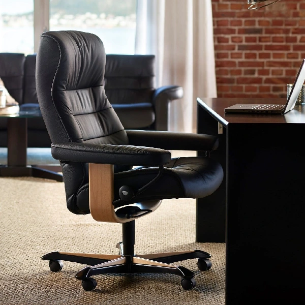black leather office chair with wood trim