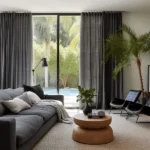 dark gray textured linen curtains, overlooking a lush backyard and pool.