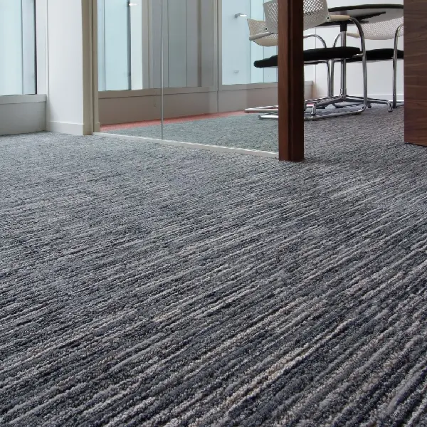 gray loop pile broadloom carpet with a subtle linear