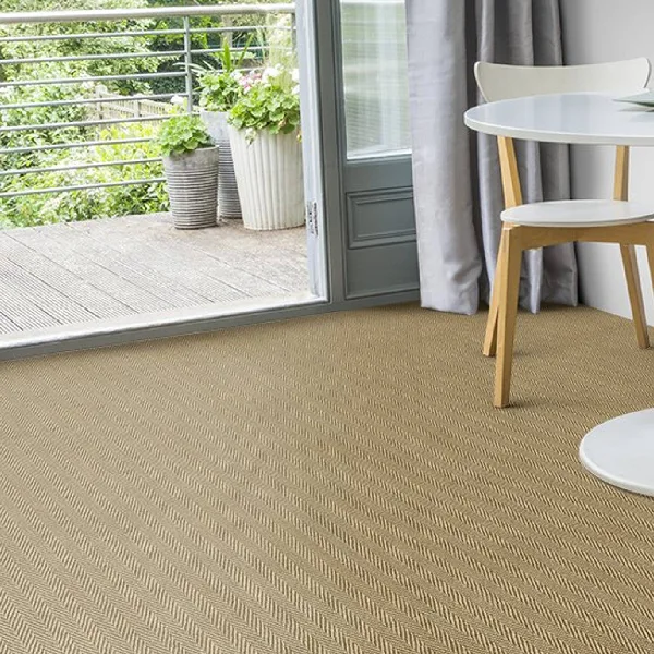 natural fiber carpet featuring a distinct herringbone pattern
