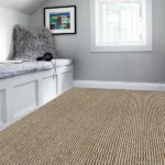 natural sisal or jute carpet with a prominent brown and beige striped weave