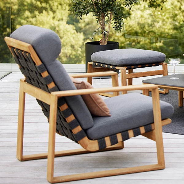 outdoor lounge chair with light wood frame