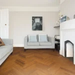 warm brown bamboo laid in a herringbone pattern.