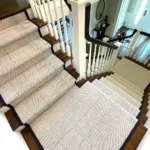 white and beige textured stair runner with a dark navy border