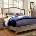 wood king-size bed with a tall, curved, cream-colored upholstered headboard