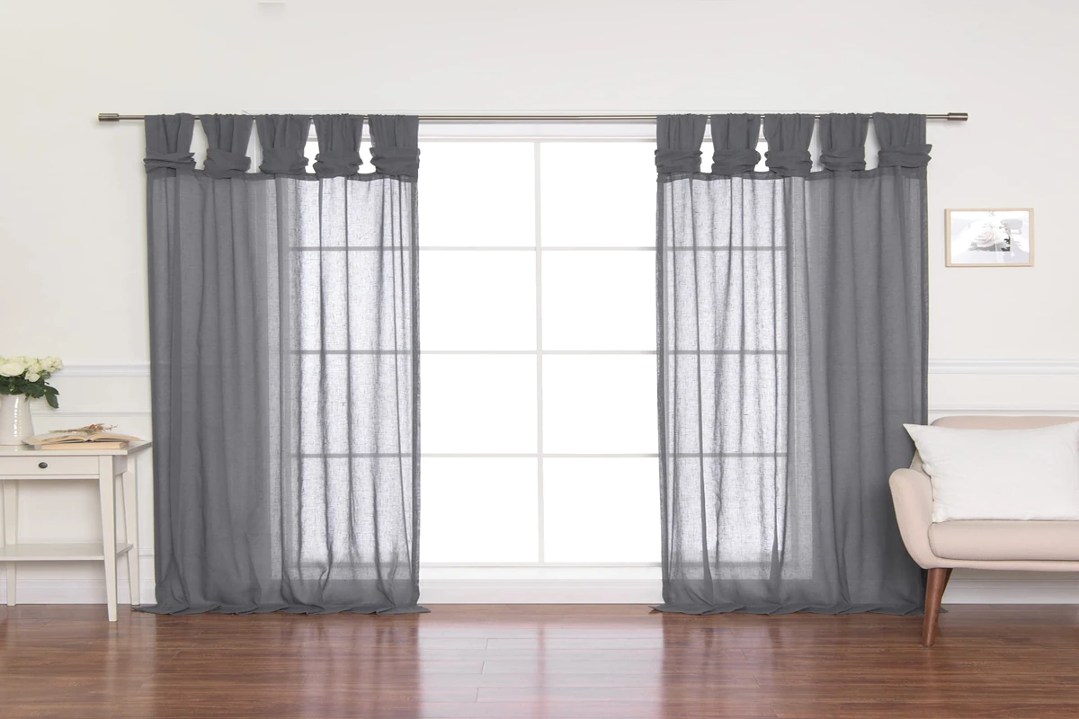Beige wall with grey curtains